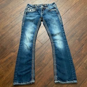 Rock revival boot cut jeans . Excellent condition.